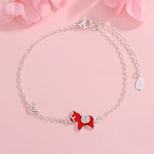 Detailed macro shot of S925 sterling silver red horse charm and coin symbol bracelet