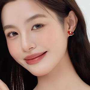 Exquisite red enamel rocking horse stud earrings with gold accents and zircon stone