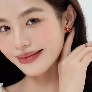 Exquisite red enamel rocking horse stud earrings with gold plating and zircon accent