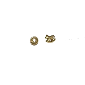 Golden rocking horse and hollow disc stud earrings with minimalist metal finish