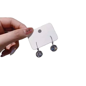 Elegant silver hoop earrings with large round sparkling zircon stones for a minimalist look