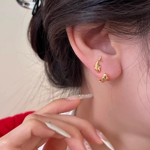 Elegant gold double dolphin stud earrings for women with high-shine metallic finish