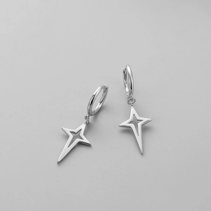 Detailed view of silver S925 geometric star hoop earrings on a neutral background