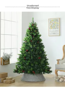 Detailed view of artificial Christmas tree with pine cones, berries, and a rattan base