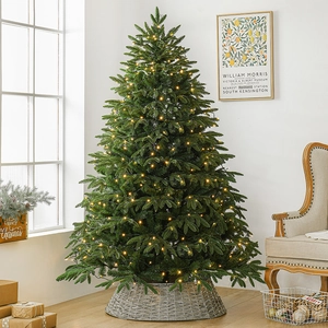 Luxury green PE mixed Christmas tree with warm LED lights and wicker base for holiday decor