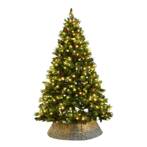 Classic artificial Christmas tree with warm LED lights, red berries, and woven base stand
