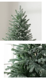 Détail d'un sapin de Noël luxe 1,8m avec des aiguilles floquées de neige blanche