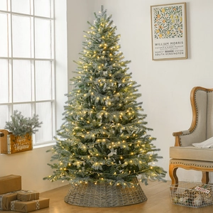 Luxurious 1.8m snowy Christmas tree with warm LED lights and woven base for home decor