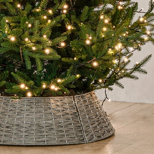 Árbol de Navidad artificial de 2,1 m con falda de base gris y luces cálidas