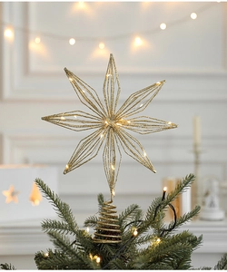Golden glittered iron star tree topper with warm LED lights and a spiral base