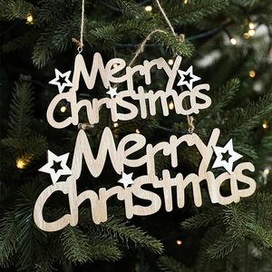 Merry Christmas wooden hanging tag on Christmas tree branch with rustic jute rope