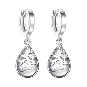 Silver drop earrings with moonlight cat eye stone and hollow totem vine patterns