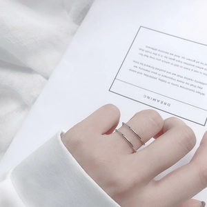 Minimalist double layer silver open ring for women with sleek aesthetic design