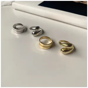 Polished S925 silver wide spiral and drop-shaped rings in gold and silver finishes