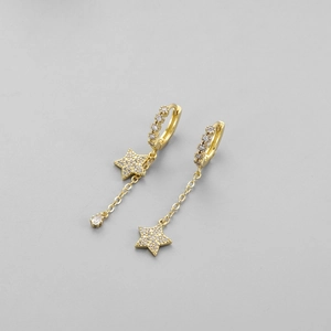 Detail of gold star hoop earrings with zircon paving and delicate dangling long chains