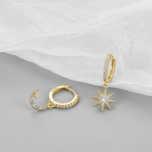 Asymmetric S925 sterling silver moon and star earrings with cubic zirconia stones