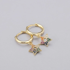 Detail of gold star drop earrings featuring colorful zircon stones in a rainbow pattern