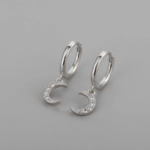 Macro view of S925 sterling silver stamp on crystal crescent moon drop earrings