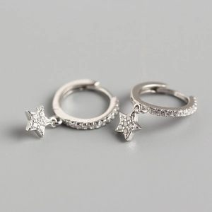 Detailed view of silver star hoop earrings featuring micro-pave cubic zirconia crystals