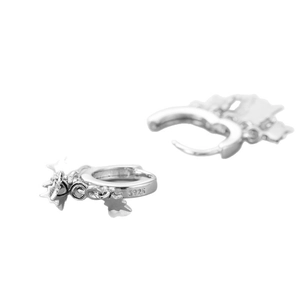 Minimalist S925 sterling silver huggie earrings featuring small hanging star charms