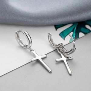 Minimalist S925 silver cross dangle hoop earrings for men and women on gray silk