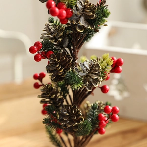 40cm artificial Christmas tree with snow, red berries and pine cones on a wooden base