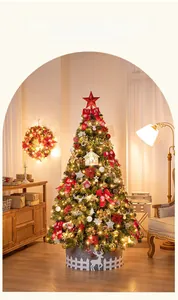 Detail of decorated luxury Christmas tree with LED Merry Christmas sign and red bows