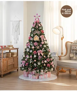 Close-up of 180cm artificial Christmas tree decorated with pink bows and LED lights