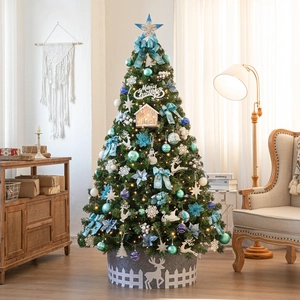 Luxurious artificial Christmas tree set with blue ornaments and warm LED light cabin decor
