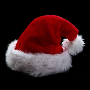 Classic red plush Christmas hat with thick white faux fur trim and pompom on black background
