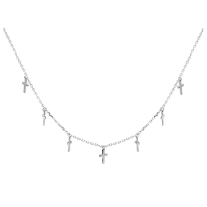 Minimalist silver chain necklace featuring seven small cross pendants for women