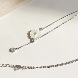 Elegant 925 sterling silver daisy necklace with shell tassel and adjustable chain
