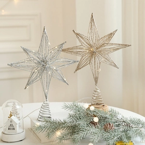 Glittery gold and silver hollow iron Christmas tree topper stars with warm LED lights