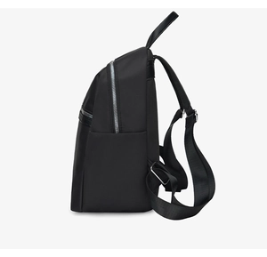 Side view of black oxford backpack showing adjustable straps and silver zipper details