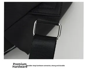 Macro shot of durable silver metal buckle and sturdy strap on a black nylon backpack