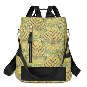 Chinese style backpack with yellow wave jacquard fabric and black leather trim for casual use