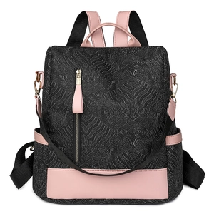 Women's faux leather backpack with black wave texture and pink contrast details