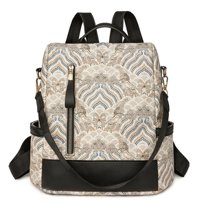 Close-up of jacquard fabric backpack showing oriental wave pattern and leather trim