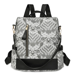Women's backpack with black and white wave pattern and elegant gold zipper details
