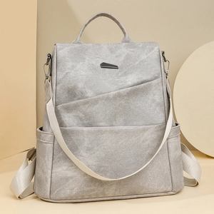 Moderner grauer Damenrucksack aus PU-Leder mit minimalistischen Vordertaschen