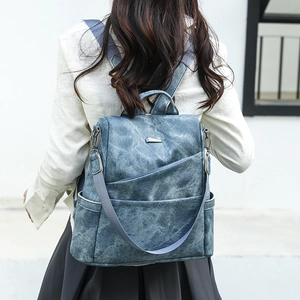 Blauer Rucksack aus PU-Leder mit Marmortextur und Vintage-Finish aus der Rückansicht
