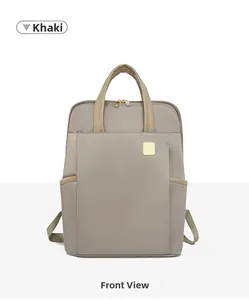 Vue détaillée d'un sac à dos Oxford kaki avec fermetures éclair dorées et poignées