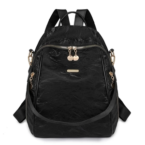 Fashionable black waterproof Oxford cloth backpack with gold zippers for women's outdoor travel