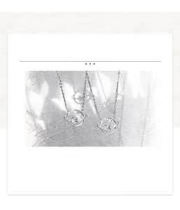 Close-up of S925 silver asteroid pendant necklaces with sparkling zircon inlay details