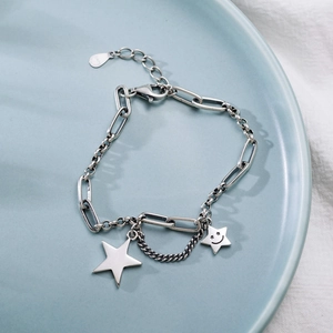 Bracciale vintage in argento sterling 925 con ciondoli a pentagramma e stella sorridente