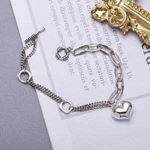 Minimalist S925 sterling silver heart bracelet with toggle clasp and asymmetric chain link