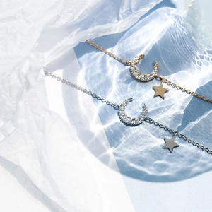 925 silver star moon chain bracelet in gold and silver finish with sparkling zircons