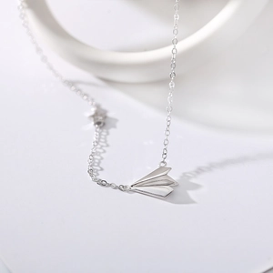 Minimalist 925 sterling silver paper plane necklace with tiny star charm on fine chain