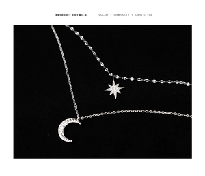 Close-up of double-layer S925 silver necklace with sparkling star and moon pendants