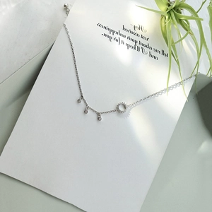 Minimalist S925 sterling silver geometric circle anklet on artistic white card